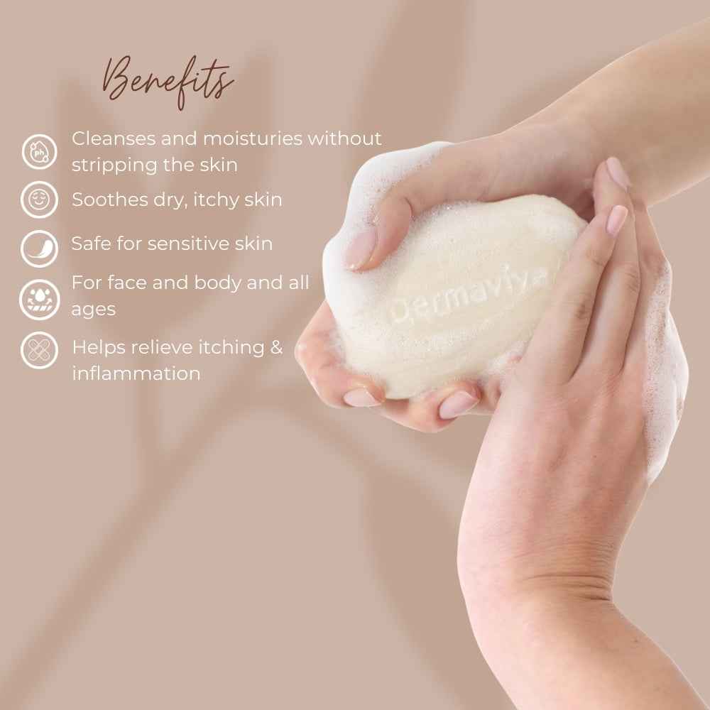 Dermavive dry skin cleansing bar being held, designed to soothe and nourish sensitive skin