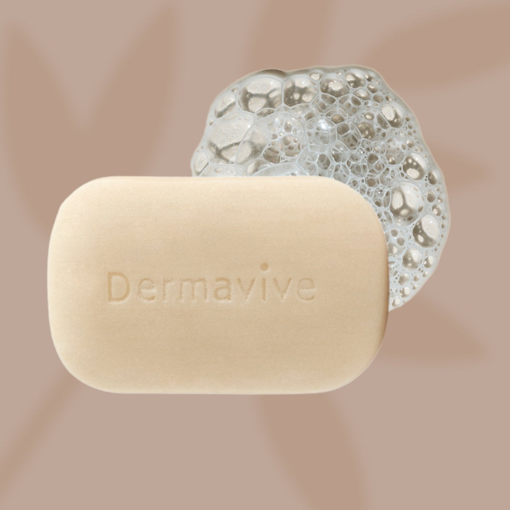Dermavive Oily Skin Cleansing Bar lathered with bubbles, highlighting its gentle yet effective cleansing properties.