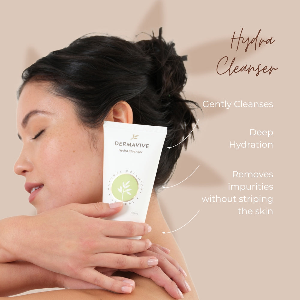 Dermavive Hydra Cleanser bottle being held, with labels pointing to benefits such as gentle cleansing, deep hydration, and impurity removal without skin stripping.